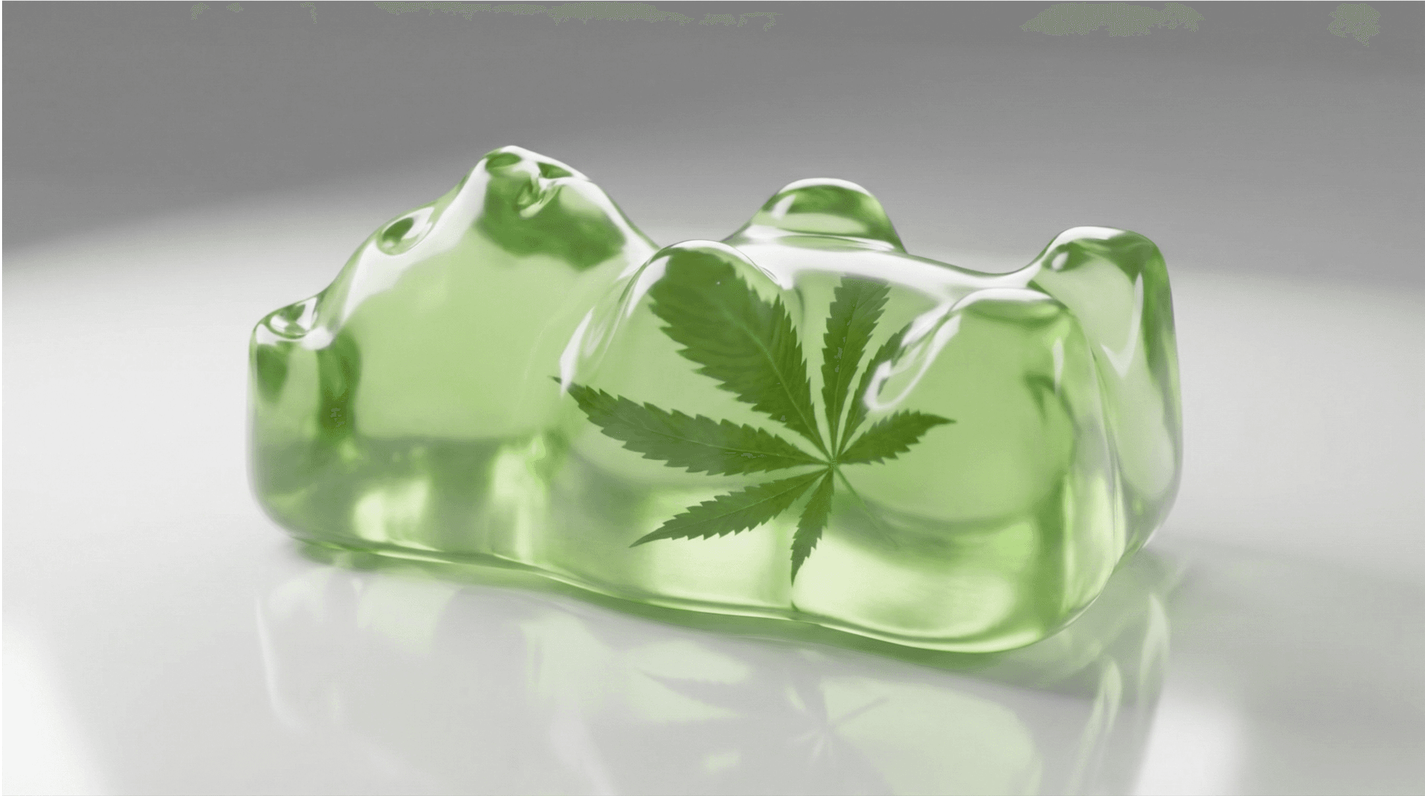 Grünes transparentes THC Gummibärchen mit Cannabisblatt